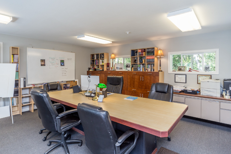 Modern meeting area with navy accents